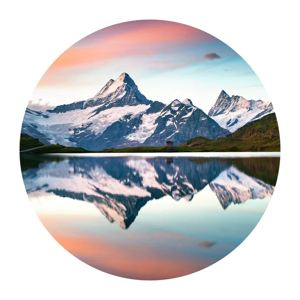 Round icon of nature with a landscape. Wetterhorn peak reflected in water surface of Bachsee lake, Bernese Oberland Alps, Grindelwald location, Switzerland, Europe. Photography in a circle.