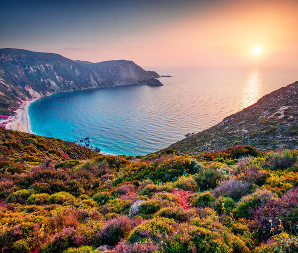 Unbelievable spring view of Petani Beach. Great sunset on Cephalonia Island, Greece, Europe. Beautiful evening seascape of Mediterranen Sea. Fantastic outdoor scene of Ionian Islands.