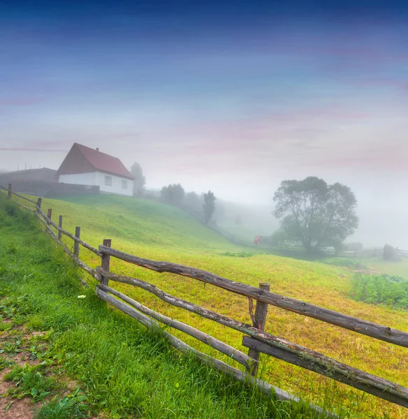 Sunrise in the mountain village. — Stock Photo, Image