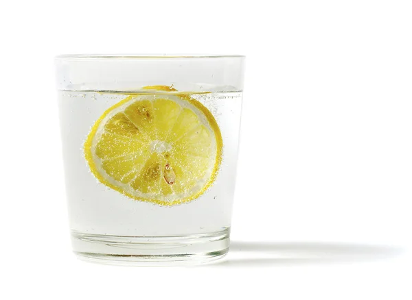 Lemon in glass — Stock Photo, Image