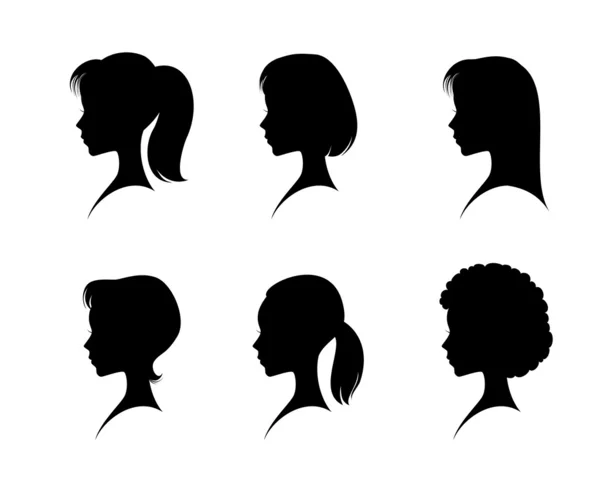 Silhouettes head girls — Stock Vector