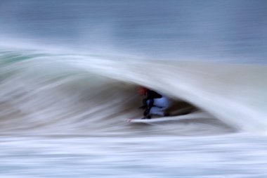 Surfer on Blue Ocean Wave clipart