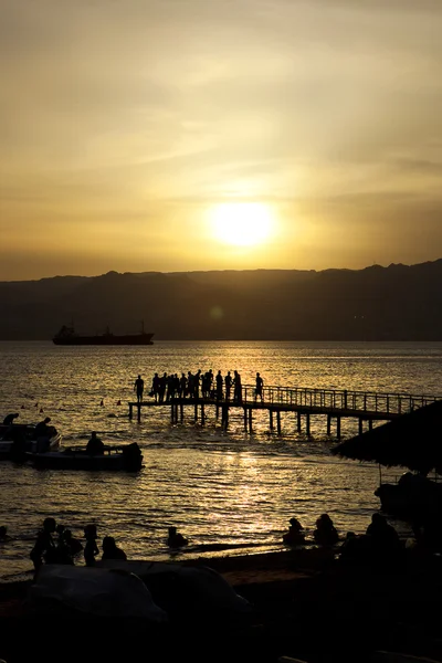 People on pier — Stock Photo, Image