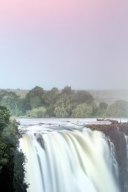 Victoria falls and the Zambezi River in Zimbabwe clipart