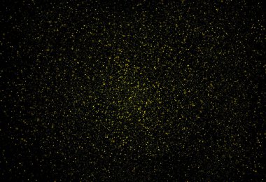 Siyah arkaplanda yüzen soyut altın tozu