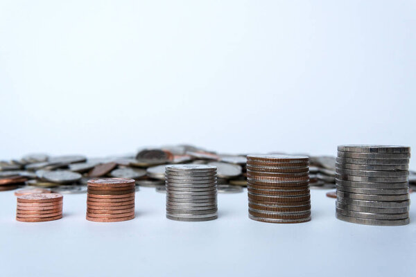 Thai coins are stacked in layers arranged from small to large.