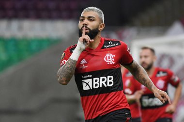 Rio de Janeiro, Brezilya, 15 Mayıs 2021 Flamengo takımından futbolcu Gabriel Gabigol, Maracan Stadyumu 'nda Carioca şampiyonası için oynanan Fluminense maçında golünü kutluyor..