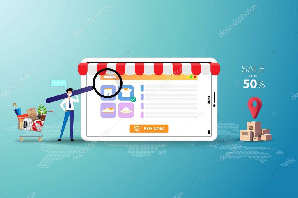 Concept of online shopping, businessman wear a white face mask and hold a big magnifier to focus on the screen of tablet to order a new shirt in green shade color background.