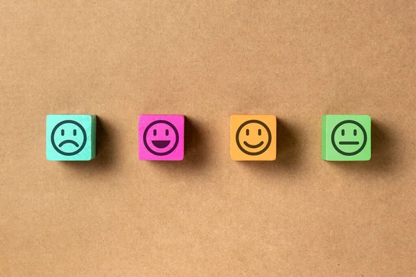 Emoticon Faces Colors Wooden Blocks Brown Paper Service Evaluation Satisfaction — Stock Photo, Image