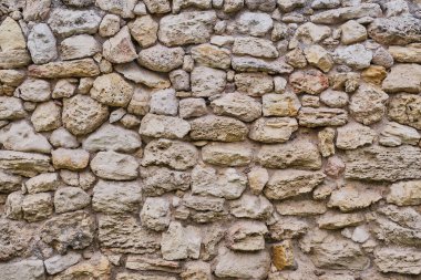 Arka plan olarak çok eski bir taş duvarın dokusu