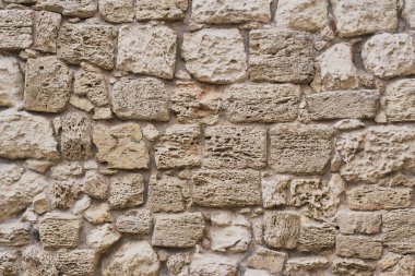 Arka plan olarak çok eski bir taş duvarın dokusu