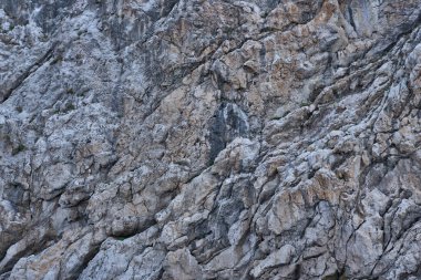 Arkaplan olarak gri kahverengi renkli kayanın dokusu