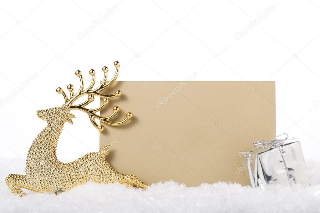 Christmas deer and gift with space of text in snow background