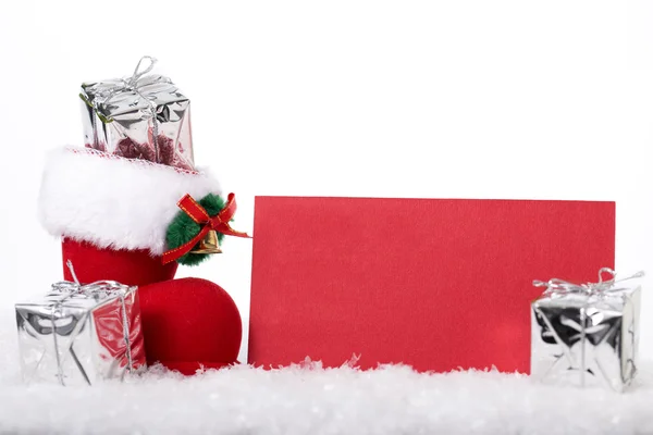 Cadeau en botte de Noël, avec carte de voeux — Photo