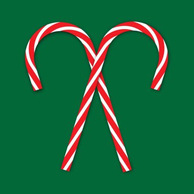 Yeşil arka planda iki kırmızı beyaz noel şekeri kamışı. Kış zamanı. Vektör çizimi. Resim yükle.