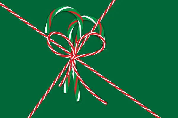 Peppermint bengalas doces de Natal com grande arco vermelho e branco. Temporada de férias. Ilustração vetorial. Imagem de stock. — Vetor de Stock