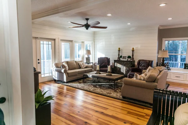 A new addition of an updated living room and den with pine hardwood floors — Stock Photo, Image