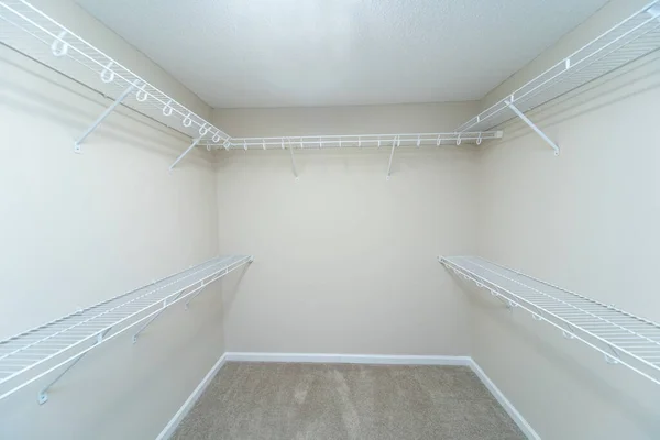 Empty wire shelving storage in an empty closet — Stock Photo, Image