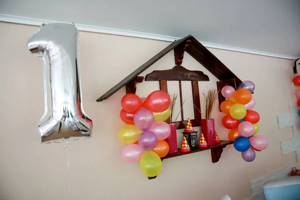 balloon decoration for birthday celebration, silver colored number 1