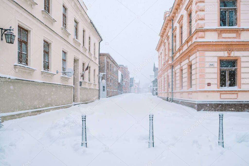 Snowy street in the historical center of Cesis, Latvia. Selective focus