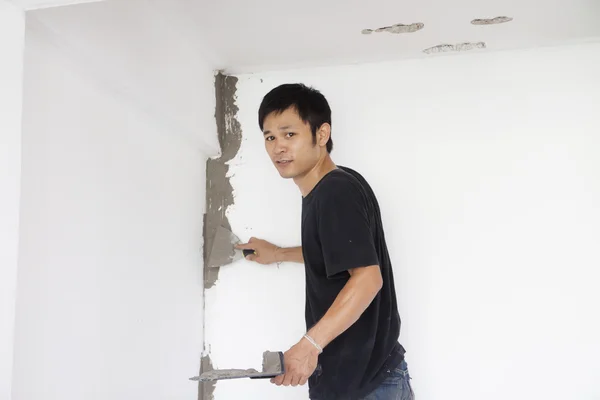 Plasterer at wall renovation decoration — Stock Photo, Image