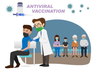 İnsanların bağışıklık sistemi için aşı kavramı. COVID-19. Bir doktor bir adamı aşılıyor. Ve aşı olmayı bekleyenler sağlık, önleme ve koronavirüse karşı bağışıklık kazanıyorlar.
