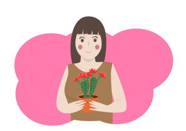 Kaktüslü güzel bir kız güzel çiçekler açıyor.