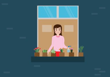 Güzel bir kız kaktüsle ilgileniyor. Yüksek bir binanın balkonunda güzel bir çiçek açıyor..