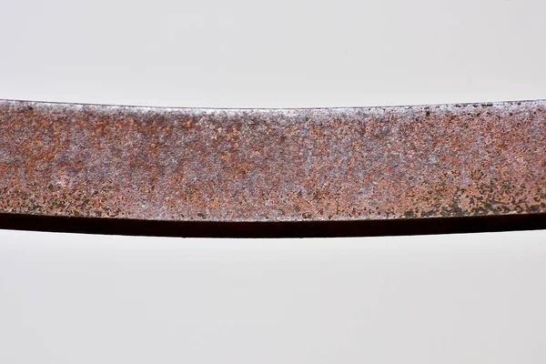 rusted flat iron or steel bar on background white