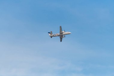 Sydney, NSW, Avustralya - 2 Mayıs 2021: REX SAAB 340 Airplane Sydney Havaalanı 'ndan kalkıyor.