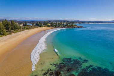 The blue sea and white sands at Bermagui in the Eurobadalla Shire on the South Coast of NSW, Australia. clipart