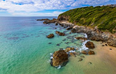 Barrington kıyısındaki Forster 'da bir mil plajı, NSW, Avustralya.
