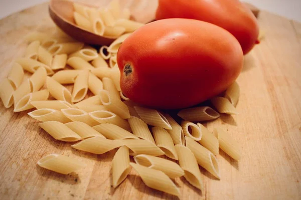 uncooked pasta raw pasta on table