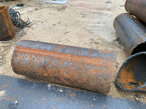 Round steel pipe with rust scattered texture