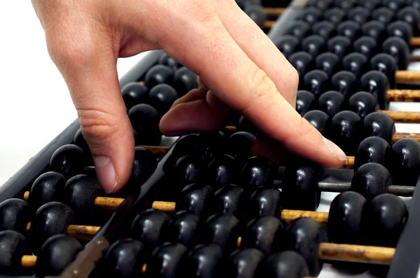Hand counting on chinese abacus — Stock Photo, Image