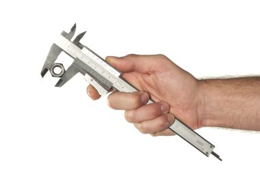 teknisyen eli fındık üzerinde beyaz izole kumpas ile ölçülür