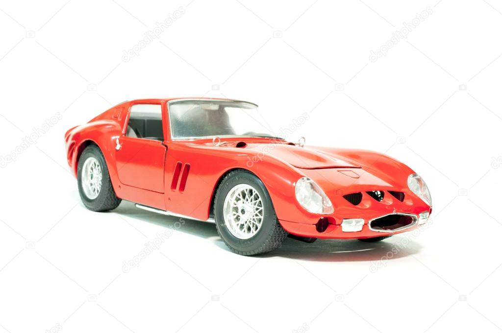 Classic red sport car isolated on white