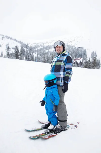 Toddler Boy Warm Blue Overalls Helmet Learns Ski His Dad — Stock Photo, Image