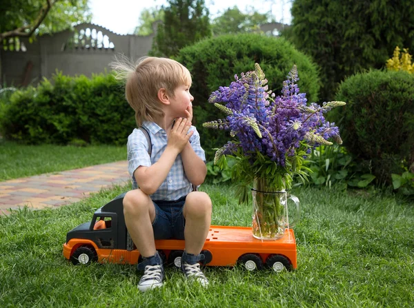 Cute Year Old Boy Shorts Shirt Sits Toy Orange Truck — Photo