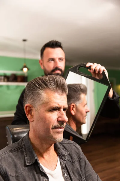 Bearded Barber Shows Haircut Hairstyle His Client Goatee Mirror Barbershop — Stock Photo, Image