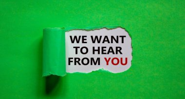 The words 'we want to hear from you' appearing behind torn green paper. Beautiful background. Business concept. clipart