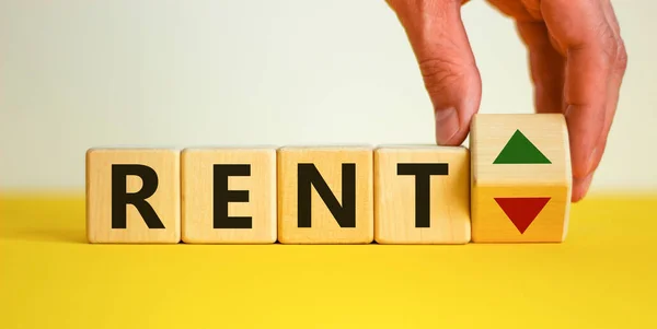 Male Hand Flips Wooden Cube Changes Inscription Rent Rent Beautiful — Stock Photo, Image