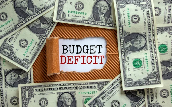 Símbolo Défice Orçamental Palavras Défice Orçamental Aparecem Atrás Papel Castanho — Fotografia de Stock