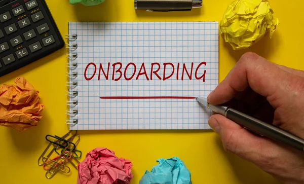 Símbolo Incorporación Empresario Escribiendo Palabra Onboarding Nota Blanca Hermoso Fondo —  Fotos de Stock