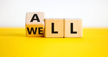 Her şey iyi bir sembol. Kelimelerle dolu küplere dönüştü. Güzel sarı masa, beyaz arka plan, kopyalama alanı. İş, motivasyon ve her şey yolunda..