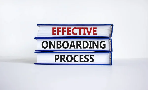 Effective onboarding process symbol. Books with words 'effective onboarding process' on beautiful white background. Business and effective onboarding process concept. Copy space.