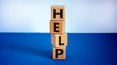 Destek ve yardım sembolü. Tahta küplerde 