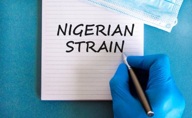 Yeni covid-19 Nijerya türü sembolü. Mavi eldiven ve beyaz kart. 