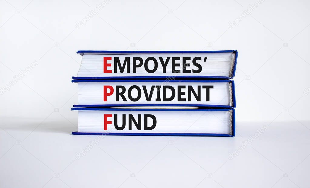 EPF, employees provident fund symbol. Books with words 'EPF, employees provident fund'. Beautiful white background, copy space. Business and EPF, employees provident fund concept.