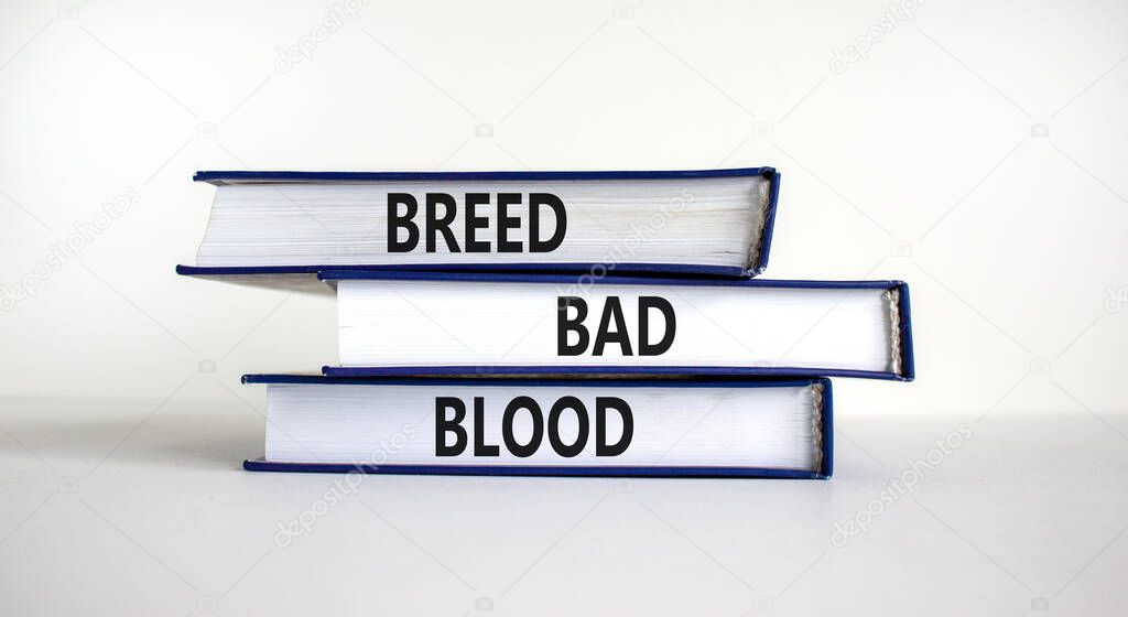 Breed bad blood symbol. Books with words 'Breed bad blood'. Beautiful white background, copy space. Business, breed bad blood concept.